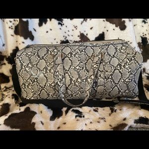 False snake skin duffel bag
